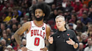 Jan 10, 2024; Chicago, Illinois, USA; Chicago Bulls guard Coby White (0) talks with head coach Billy Donovan during the second half at United Center. Mandatory Credit: David Banks-Imagn Images