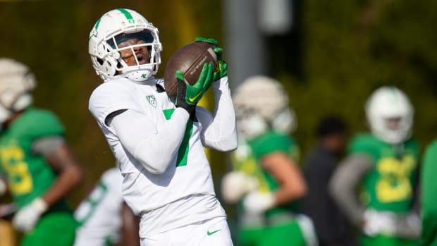 Oregon wide receiver Evan Stewart makes a catch during practice with the Ducks Tuesday,