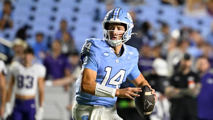 Sep 1, 2025; Chapel Hill, North Carolina, USA; North Carolina Tar Heels quarterback Max Johnson (14) looks to pass in the third quarter at Kenan Stadium. Mandatory Credit: Bob Donnan-Imagn Images