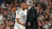 Kylian Mbappé und Carlo Ancelotti