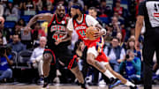 Oct 23, 2024; New Orleans, Louisiana, USA;  New Orleans Pelicans forward Brandon Ingram (14) dribbles against Chicago Bulls forward Patrick Williams (44) during the first half at Smoothie King Center.