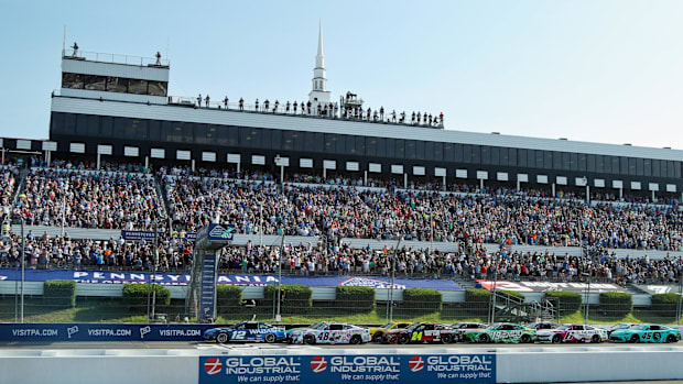 Ryan Blaney (12) leads the field on a restart during The Great American Getaway 400 at Pocono Raceway.