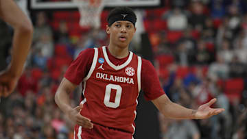 Mar 21, 2025; Raleigh, NC, USA;  Oklahoma Sooners guard Jeremiah Fears (0) reacts after scoring against Connecticut Huskies during the second half at Lenovo Center. Mandatory Credit: Zachary Taft-Imagn Images