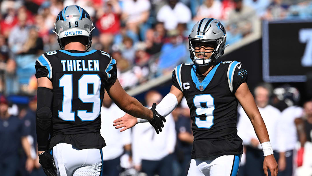 Oct 29, 2023; Charlotte, North Carolina, USA;  Carolina Panthers wide receiver Adam Thielen (19) and quarterback Bryce Young (9) react in the second quarter at Bank of America Stadium. Mandatory Credit: Bob Donnan-Imagn Images