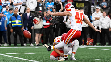 Nov 24, 2024; Charlotte, North Carolina, USA; Kansas City Chiefs place kicker Spencer Shrader (40) kicks the winning field goal at the end of the game at Bank of America Stadium. Mandatory Credit: Bob Donnan-Imagn Images
