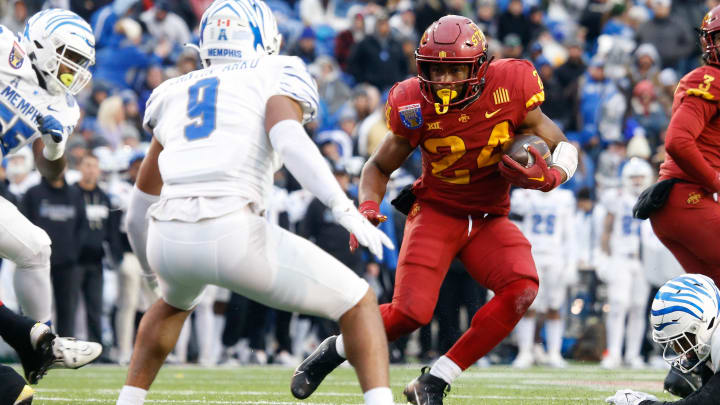 Dec 29, 2023; Memphis, TN, USA; Iowa State Cyclones running back Abu Sama III (24) runs the ball  during the first half against the Memphis Tigers at Simmons Bank Liberty Stadium. Mandatory Credit: Petre Thomas-USA TODAY Sports