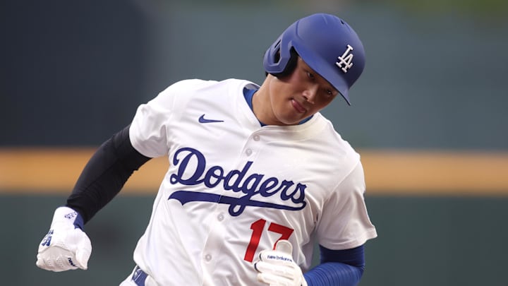 National League designated hitter Shohei Ohtani (17) of the Los Angeles Dodgers runs home to score in the first inning against the American League during the 2025 MLB All Star Game at Truist Park on July 15. National League designated hitter Shohei Ohtani (17) of the Los Angeles Dodgers runs home to score in the first inning against the American League during the 2025 MLB All Star Game at Truist Park on July 15.