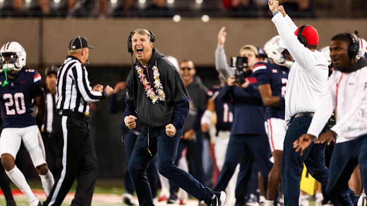 Nov 15, 2024; Tucson, Arizona, USA; Arizona Wildcats head coach Brent Brennan celebrates a interception made against the Houston Cougars during the second quarter at Arizona Stadium. Mandatory Credit: Aryanna Frank-Imagn Images