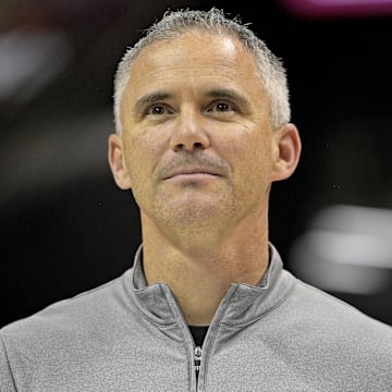 Mar 9, 2024; Tallahassee, Florida, USA; Florida State Seminoles head football coach Mike Norvell accepts the Bear Bryant coach of the Year award during a media timeout of a basketball game against the Miami Hurricanes at Donald L. Tucker Center. Mandatory Credit: Melina Myers-Imagn Images