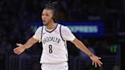 Jan 17, 2025; Los Angeles, California, USA;  Brooklyn Nets forward Ziaire Williams (8) reacts after a 3-point basket against the Los Angeles Lakers at Crypto.com Arena. Mandatory Credit: Jayne Kamin-Oncea-Imagn Images