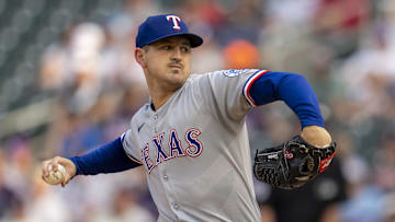 Jun 10, 2025; Minneapolis, Minnesota, USA; Texas Rangers starting pitcher Tyler Mahle (51) delivers a pitch against the Minnesota Twins in the first inning at Target Field.