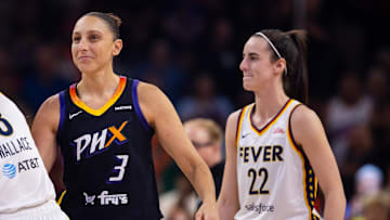 Jun 30, 2024; Phoenix, Arizona, USA; Indiana Fever guard Caitlin Clark (22) against Phoenix Mercury guard Diana Taurasi (3) during a WNBA game at Footprint Center. Mandatory Credit: Mark J. Rebilas-Imagn Images