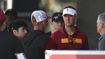 Oct 19, 2024; College Park, Maryland, USA;  Southern California Trojans head coach Lincoln Riley stands outside the lockeroom before the game against the Maryland Terrapins at SECU Stadium. Mandatory Credit: Tommy Gilligan-Imagn Images