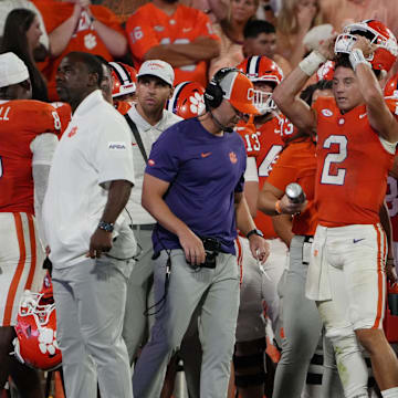 Aug 30, 2025; Clemson, South Carolina, USA; Clemson Tigers quarterback Cade Klubnik (2) takes off his helmet on the sideline during the second half at Memorial Stadium. Mandatory Credit: Ken Ruinard-USA TODAY Network via Imagn Images