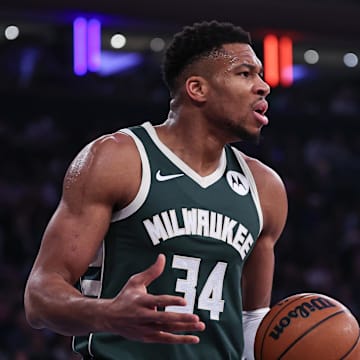 Dec 25, 2023; New York, New York, USA; Milwaukee Bucks forward Giannis Antetokounmpo (34) reacts after being called for a foul during the first quarter against the New York Knicks at Madison Square Garden. Mandatory Credit: Vincent Carchietta-Imagn Images