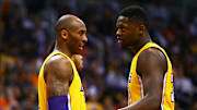 Los Angeles Lakers guard Kobe Bryant and forward Julius Randle against the Phoenix Suns at Talking Stick Resort Arena.