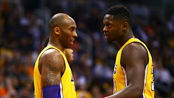 Los Angeles Lakers guard Kobe Bryant and forward Julius Randle against the Phoenix Suns at Talking Stick Resort Arena.