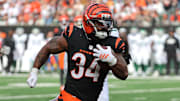 Oct 26, 2025; Cincinnati, Ohio, USA; Cincinnati Bengals running back Samaje Perine (34) runs with the ball during the third quarter against the New York Jets at Paycor Stadium. Mandatory Credit: Joseph Maiorana-Imagn Images