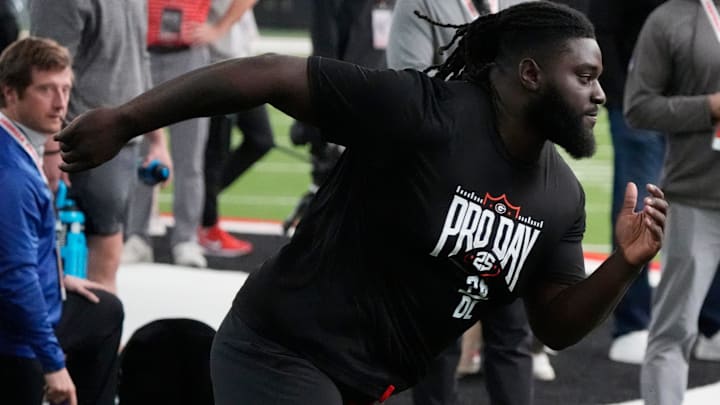 Former Georgia defensive lineman Nazir Stackhouse (78) runs a drill during UGA Football's Pro Day in Athens, Ga.