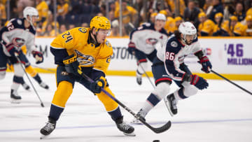 Apr 13, 2024; Nashville, Tennessee, USA; Nashville Predators defenseman Spencer Stastney (24) skates against the Columbus Blue Jackets during the first period at Bridgestone Arena. Mandatory Credit: Steve Roberts-USA TODAY Sports