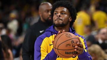 Oct 4, 2024; Palm Desert, California, USA; Los Angeles Lakers guard Bronny James (9) shoots during warmups against the Minnesota Timberwolves at Acrisure Arena. Mandatory Credit: Jonathan Hui-Imagn Images