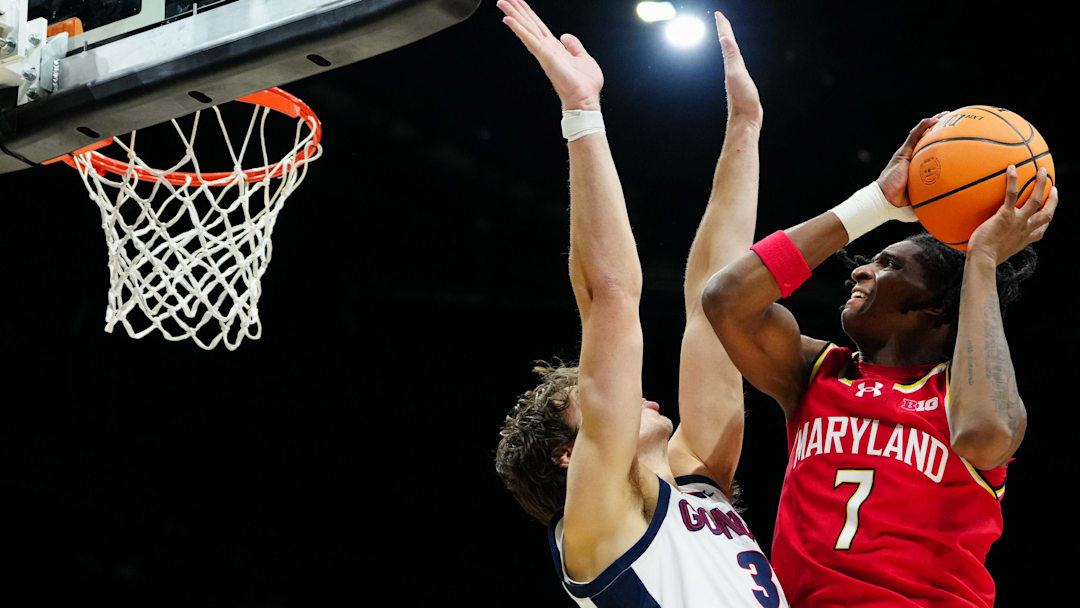 Nov 25, 2025; Las Vegas, NV, USA; Maryland Terrapins guard Andre Mills (7) shoots in the second half against Gonzaga Bulldogs in a 2025 Players Era Festival group play game at MGM Grand Garden Arena.