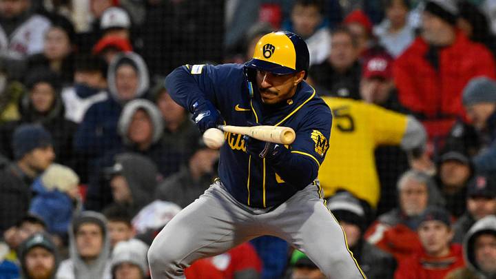 Apr 7, 2026; Boston, Massachusetts, USA; Milwaukee Brewers second baseman David Hamilton (6) bunts against the Boston Red Sox during the third inning at Fenway Park. Mandatory Credit: Eric Canha-Imagn Images