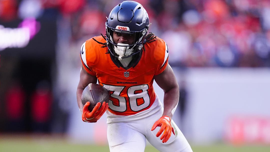 Jan 17, 2026; Denver, CO, USA; Denver Broncos running back Jaleel McLaughlin (38) runs during the third quarter of an AFC Divisional Round playoff game against the Buffalo Bills at Empower Field at Mile High. 