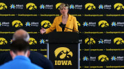 Jan Jensen speaks to media personnel after being named the new Iowa women’s basketball head coach Wednesday, May 15, 2024 at Carver-Hawkeye Arena in Iowa City, Iowa.