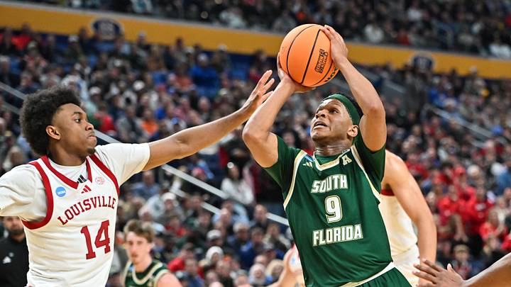 The USF men's basketball team won both the regular season and tournament titles in the American Conference