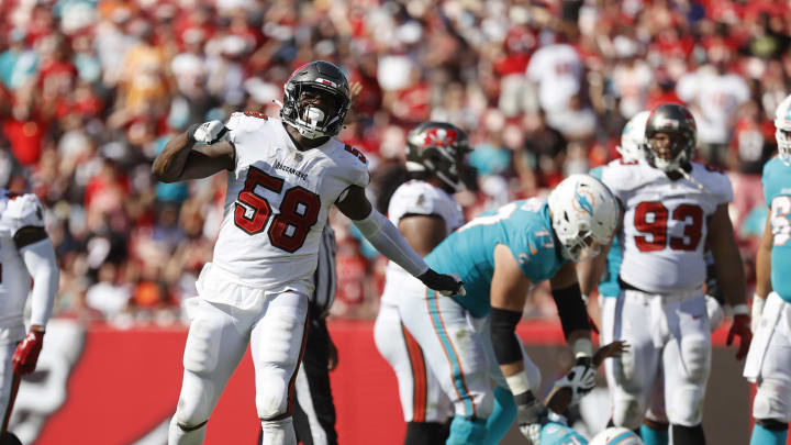 Oct 10, 2021; Tampa, Florida, USA; Tampa Bay Buccaneers outside linebacker Shaquil Barrett (58) sacks  Miami Dolphins quarterback Jacoby Brissett (14) during the second half at Raymond James Stadium.