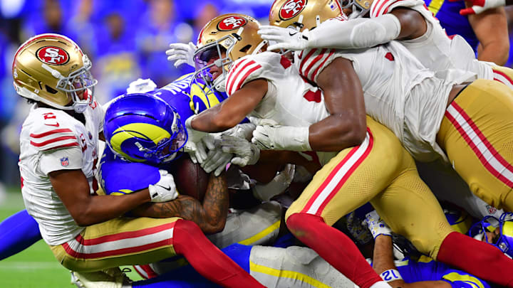 Oct 2, 2025; Inglewood, California, USA; Los Angeles Rams running back Kyren Williams (23) is tackled for no gain on fourth down to end the game against the San Francisco 49ers during overtime at SoFi Stadium. Mandatory Credit: Gary A. Vasquez-Imagn Images Oct 2, 2025; Inglewood, California, USA; Los Angeles Rams running back Kyren Williams (23) is tackled for no gain on fourth down to end the game against the San Francisco 49ers during overtime at SoFi Stadium. Mandatory Credit: Gary A. Vasquez-Imagn Images