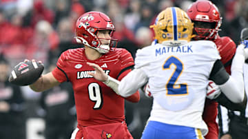 Nov 23, 2024; Louisville, Kentucky, USA;  Louisville Cardinals quarterback Tyler Shough (9) throws against the Pittsburgh Panthers during the first half at L&N Federal Credit Union Stadium. Louisville defeated Pittsburgh 37-9. Mandatory Credit: Jamie Rhodes-Imagn Images