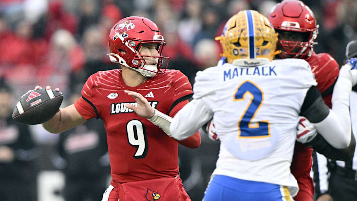 Nov 23, 2024; Louisville, Kentucky, USA;  Louisville Cardinals quarterback Tyler Shough (9) throws against the Pittsburgh Panthers during the first half at L&N Federal Credit Union Stadium. Louisville defeated Pittsburgh 37-9. Mandatory Credit: Jamie Rhodes-Imagn Images
