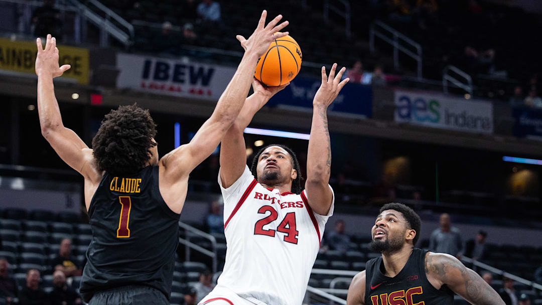 Mar 12, 2025; Indianapolis, IN, USA;  Rutgers Scarlet Knights center Lathan Sommerville (24) shoots the ball while USC Trojans guard Desmond Claude (1) defends in the second half at Gainbridge Fieldhouse. Mandatory Credit: Trevor Ruszkowski-Imagn Images