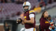 Oct 11, 2025; Minneapolis, Minnesota, USA; Minnesota Golden Gophers quarterback Drake Lindsey (5) warms up before the game against the Purdue Boilermakers at Huntington Bank Stadium. Mandatory Credit: Matt Krohn-Imagn Images