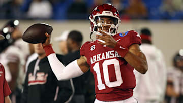 Dec 27, 2024; Memphis, TN, USA; Arkansas Razorbacks quarterback Taylen Green (10) passes the ball during warm ups prior to the game against the Texas Tech Red Raiders at Simmons Bank Liberty Stadium. Mandatory Credit: Petre Thomas-Imagn Images