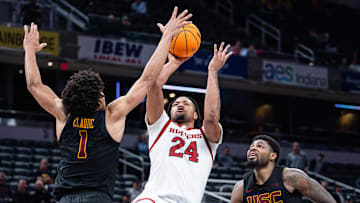 Mar 12, 2025; Indianapolis, IN, USA;  Rutgers Scarlet Knights center Lathan Sommerville (24) shoots the ball while USC Trojans guard Desmond Claude (1) defends in the second half at Gainbridge Fieldhouse. Mandatory Credit: Trevor Ruszkowski-Imagn Images