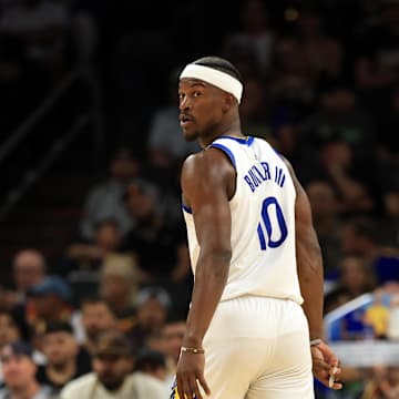 Apr 8, 2025; Phoenix, Arizona, USA; Golden State Warriors forward Jimmy Butler III (10) with guard Stephen Curry (30) against the Phoenix Suns at Footprint Center. Mandatory Credit: Mark J. Rebilas-Imagn Images