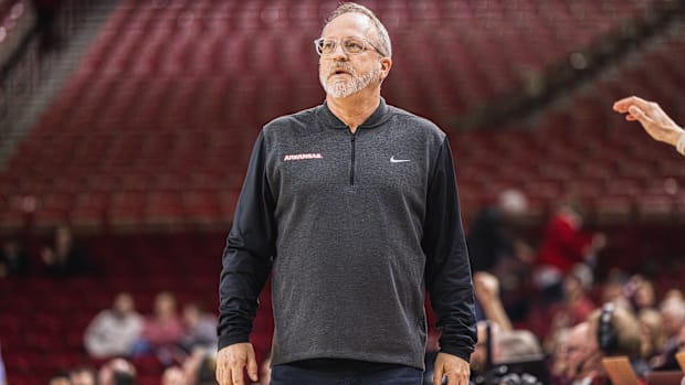 Arkansas head coach Mike Neighbors reacts