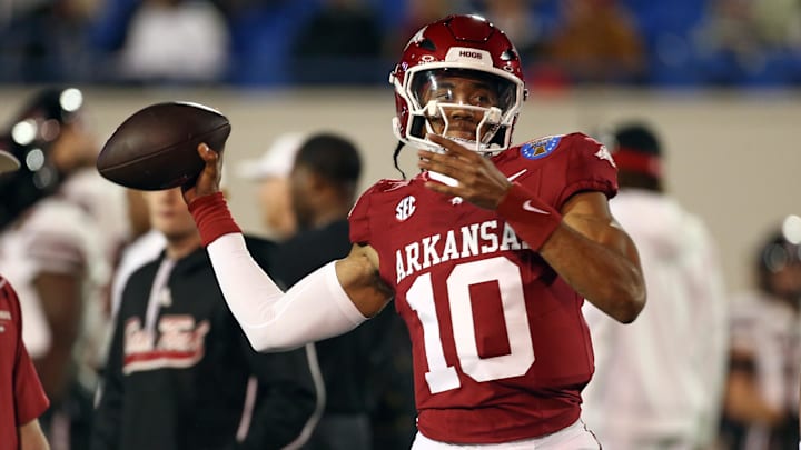 Dec 27, 2024; Memphis, TN, USA; Arkansas Razorbacks quarterback Taylen Green (10) passes the ball during warm ups prior to the game against the Texas Tech Red Raiders at Simmons Bank Liberty Stadium. Mandatory Credit: Petre Thomas-Imagn Images