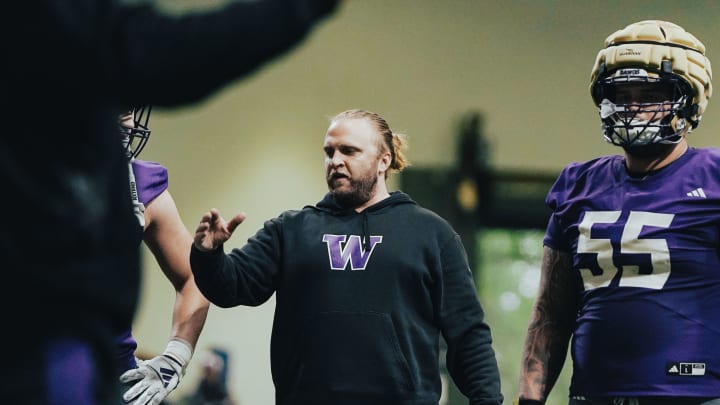 Steve Belichick advises his UW defense during spring ball. 