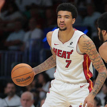 Miami Heat center Kel'el Ware (7) dribbles the basketball as Cleveland Cavaliers center Jarrett Allen (31) defends in the third quarter during game three for the first round of the 2025 NBA Playoffs at Kaseya Center.