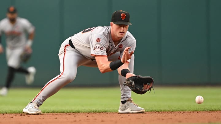 Aug 6, 2024; Washington, District of Columbia, USA; San Francisco Giants short stop Tyler Fitzgerald (49) fields a ground ball against the Washington Nationals during the first inning at Nationals Park. 