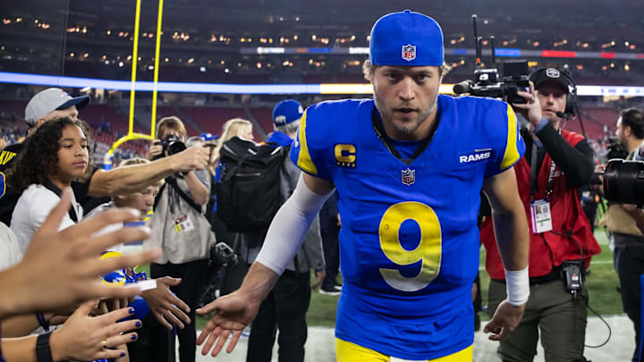 Jan 13, 2025; Glendale, AZ, USA; Los Angeles Rams quarterback Matthew Stafford (9) against the Minnesota Vikings during an NFC wild card game at State Farm Stadium. Mandatory Credit: Mark J. Rebilas-Imagn Images