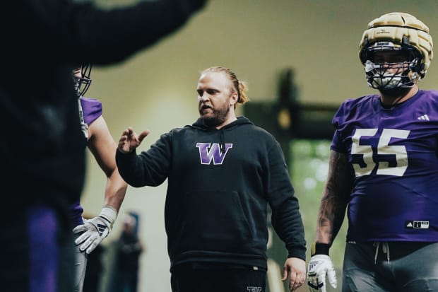 Steve Belichick advises his UW defense during spring ball. 