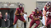 Nov 9, 2024; Blacksburg, Virginia, USA;  Virginia Tech Hokies quarterback Kyron Drones (1) looks to pass the ball against the Clemson Tigers during the second quarter at Lane Stadium. Mandatory Credit: Brian Bishop-Imagn Images