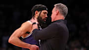 Mar 24, 2024; Brooklyn, NY, USA; Northwestern Wildcats head coach Chris Collins reacts with guard Boo Buie (0) in the second round of the 2024 NCAA Tournament at the Barclays Center. Mandatory Credit: Brad Penner-Imagn Images