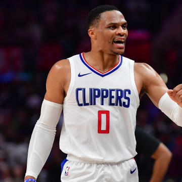 Jan 21, 2024; Los Angeles, California, USA; Los Angeles Clippers guard Russell Westbrook (0) celebrates the victory against the Brooklyn Nets at Crypto.com Arena. Mandatory Credit: Gary A. Vasquez-USA TODAY Sports