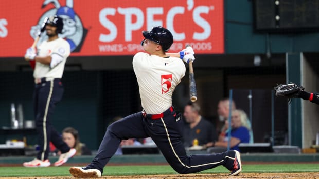 Corey Seager was 3 for 3 with two home runs and three RBI in Friday's loss to the Red Sox.